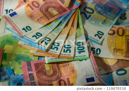 Several hundred euro banknotes stacked by value. Euro money con 119870538