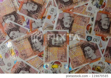 British Currency - ten pound banknotes in a spreading fan format. British Currency - ten pound banknotes in a spreading fan format. 119870585