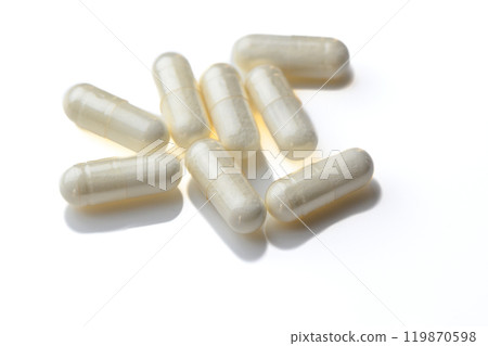 useful capsules with medicine painted in studio filming 7 119870598