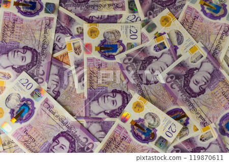 20 pound sterling bank notes closeup view business background 119870611
