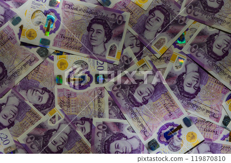 British currency - close up of the new 2016 polymer five pound note with enhanced counterfeit resilience. 2 119870810
