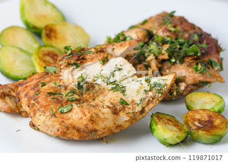 Fried chicken breast in a plate on the table 119871017