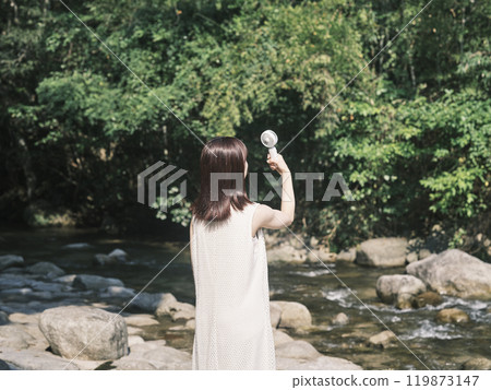 Women playing on the river 119873147