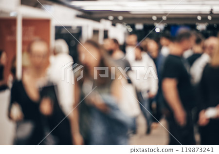 Abstract blurred people at exhibition hall of expo event trade show. Business convention show or job fair. Business concept background Abstract blurred people at exhibition hall of expo event trade show. Business convention show or job fair. Business concept background 119873241