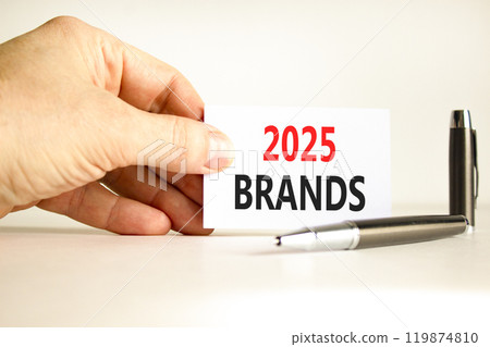 Planning 2025 brands new year symbol. Concept words 2025 Brands on beautiful white card. Beautiful white background. Businessman hand. Business 2025 brands new year concept. Copy space. 119874810
