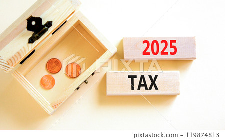 Planning 2025 tax new year symbol. Concept words 2025 Tax on beautiful wooden blocks. Beautiful white background. Wooden chest with coins. Business 2025 tax new year concept. Copy space. 119874813