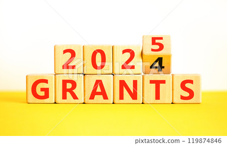 Planning 2025 grants new year symbol. Concept words 2024 Grants to 2025 Grants on beautiful wooden blocks. Beautiful yellow table white background. Business 2025 grants new year concept. Copy space. 119874846