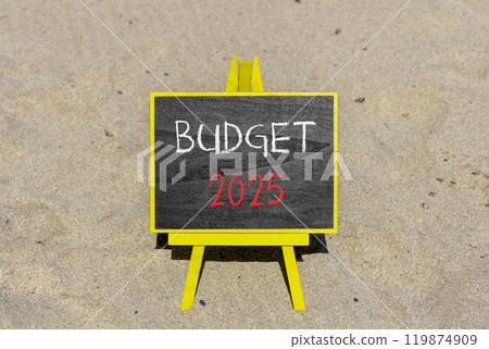 Planning budget 2025 new year symbol. Concept words Budget 2025 on beautiful yellow chalk blackboard. Beautiful sand beach background. Business budget 2025 new year concept. Copy space. Planning budget 2025 new year symbol. Concept words Budget 2025 on beautiful yellow chalk blackboard. Beautiful sand beach background. Business budget 2025 new year concept. Copy space. 119874909
