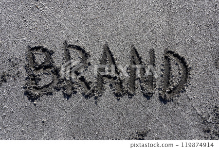 Business brand concept. Concept word brand written on beautiful ocean sand beach. Beautiful ocean sand beach background, copy space. Business brand concept. 119874914
