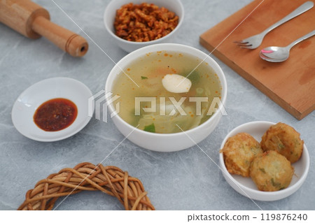 traditional Indonesian meal arranged neatly on a marble background 119876240