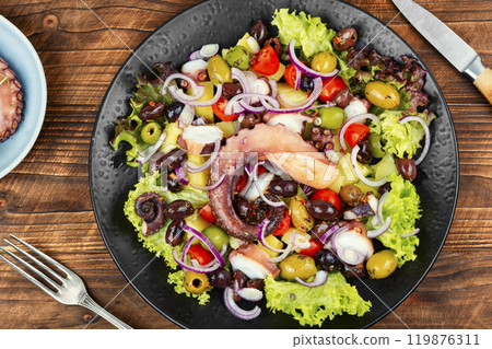 Exclusive salad with octopus, greens and vegetables. Exclusive salad with octopus, greens and vegetables. 119876311