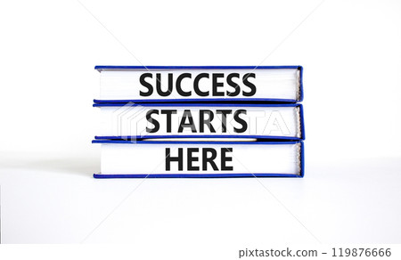Success starts here symbol. Concept word Success starts here on beautiful books. Beautiful white table white background. Business motivational success starts here concept. Copy space. 119876666