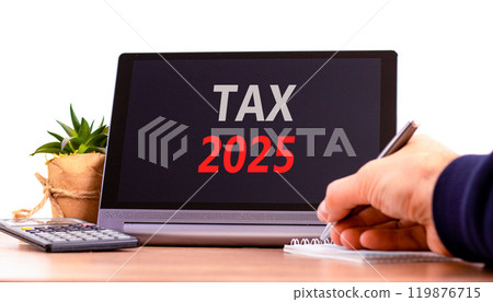 Planning tax 2025 new year symbol. Concept words Tax 2025 on beautiful black tablet. Beautiful white background. Businessman hand. Business tax 2025 new year concept. Copy space. Planning tax 2025 new year symbol. Concept words Tax 2025 on beautiful black tablet. Beautiful white background. Businessman hand. Business tax 2025 new year concept. Copy space. 119876715