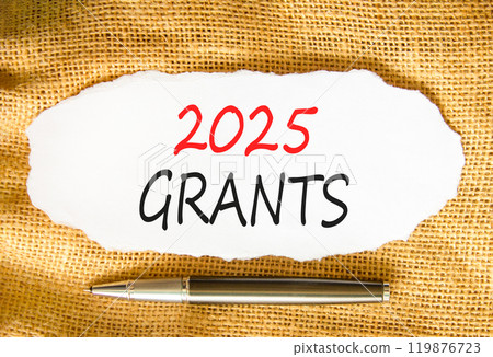 Planning 2025 grants new year symbol. Concept words 2025 Grants on beautiful white paper. Beautiful canvas background. Beautiful metallic pen. Business 2025 grants new year concept. Copy space. 119876723