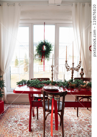Beautiful Christmas interior. A table and a 119876810