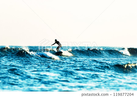 Surfer floating in the sea 119877204