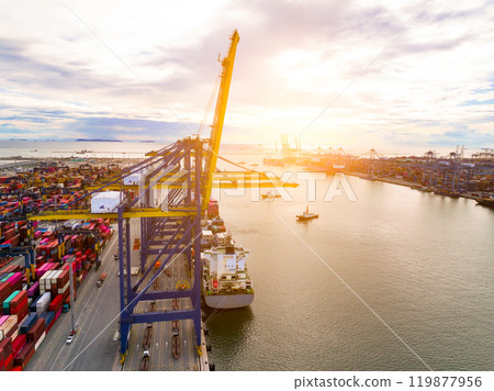 Logistics and transportation of container cargo ship at ship port. Container truck and crane bridge in shipyard. Import export and transport industry. Terminal port for export transport by ship. Logistics and transportation of container cargo ship at ship port. Container truck and crane bridge in shipyard. Import export and transport industry. Terminal port for export transport by ship. 119877956