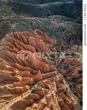 red sand and clay mountains Las Carcavas by Madrid, eroded badlands formation and desert landscape, aerial top view red sand and clay mountains Las Carcavas by Madrid, eroded badlands formation and desert landscape, aerial top view 119878691