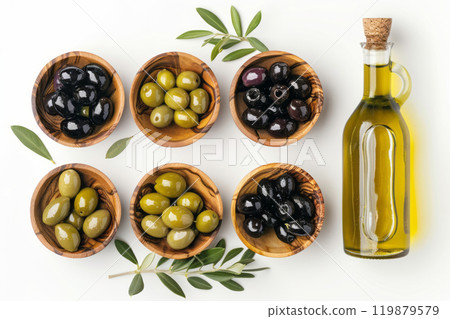 Black and green olives in wooden bowls and olive oil bottle Black and green olives in wooden bowls and olive oil bottle 119879579