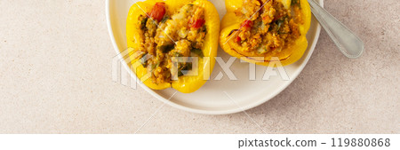 Enjoy a delicious and wholesome meal with stuffed bell peppers filled with quinoa, lentils, and vegetables, ideal for a balanced, healthy breakfast or lunch, banner Enjoy a delicious and wholesome meal with stuffed bell peppers filled with quinoa, lentils, and vegetables, ideal for a balanced, healthy breakfast or lunch, banner 119880868