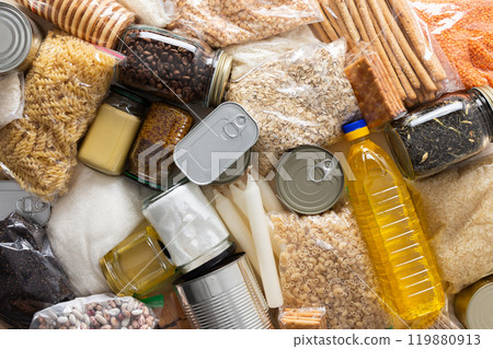 Canned goods, cereals, and pasta stored for quarantine and isolation, ensuring long-term survival and food security at home, survival during military operations, the concept of stay at home 119880913
