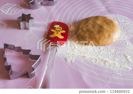 Gingerbread dough with Christmas cookies shape, top view. Christmas decoration. Advent concept. Shortbread handmade cookies for winter holidays. Making Christmas biscuits. Gingerbread dough with Christmas cookies shape, top view. Christmas decoration. Advent concept. Shortbread handmade cookies for winter holidays. Making Christmas biscuits. 119880932