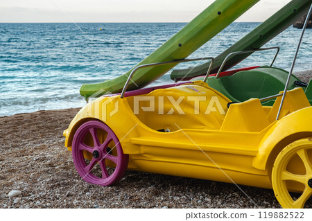 Slide in the form of a car on the beach Slide in the form of a car on the beach 119882522