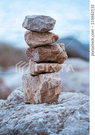 Stone pyramids on the beach Stone pyramids on the beach 119882532