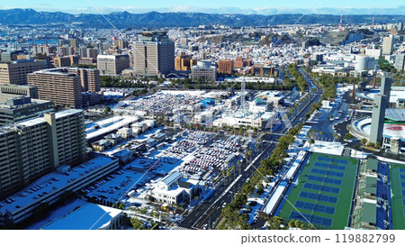 Aerial view of the snow-covered cityscape from the coast of Yojiro, Kagoshima City Aerial view of the snow-covered cityscape from the coast of Yojiro, Kagoshima City 119882799