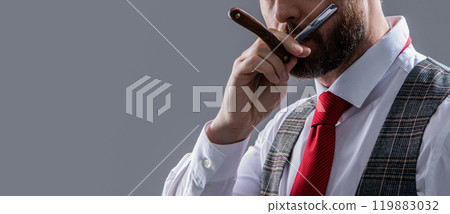 unshaven man barber hold blade isolated on grey background with copy space. 119883032