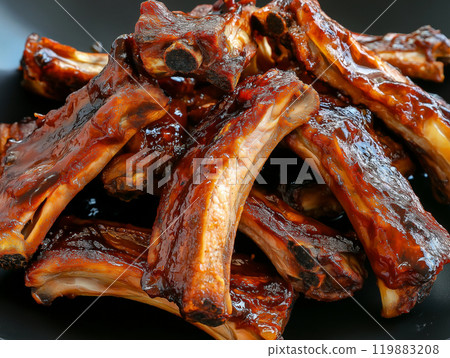 Close-up of glazed barbecue pork ribs with a rich, glossy sauce, highlighting savory Close-up of glazed barbecue pork ribs with a rich, glossy sauce, highlighting savory 119883208