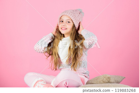 Keep knitwear soft after washing. Soft knitted accessory. Tips for caring for knitted garments. Child long hair warm soft woolen hat enjoy softness. Kid girl wear knitted soft hat pink background Keep knitwear soft after washing. Soft knitted accessory. Tips for caring for knitted garments. Child long hair warm soft woolen hat enjoy softness. Kid girl wear knitted soft hat pink background 119883268