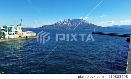 Aerial view of snow-covered Sakurajima from Kamoike Ferry Pier in Kagoshima City Aerial view of snow-covered Sakurajima from Kamoike Ferry Pier in Kagoshima City 119883398