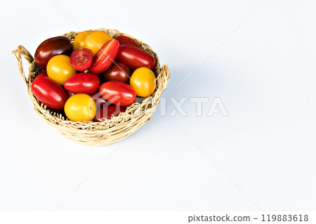 Colorful of fresh, red and yellow cherry tomatoes in the foreground 119883618