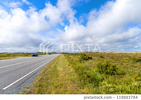 Highway with cars on a cloudy summer day. Highway with cars on a cloudy summer day. 119883784