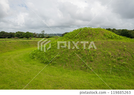 Burial mounds covered in greenery Burial mounds covered in greenery 119885263