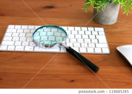 Computer and magnifying glass, virus protection, personal information leakage prevention 119885265