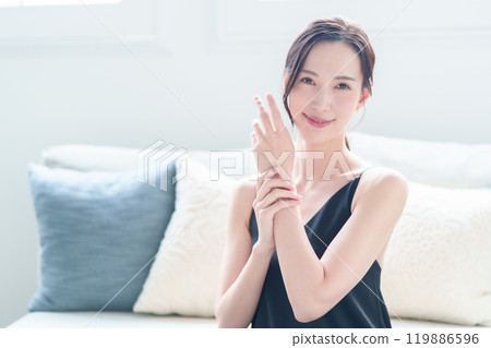 Young woman, hand care, skin care Young woman, hand care, skin care 119886596