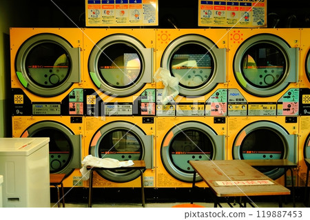 Scenery of a coin laundry A slightly retro yellow coin laundry 119887453