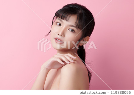 Beautiful young asian woman with clean fresh skin on pink background, Face care, Facial treatment, Cosmetology, beauty and spa, Asian women portrait. 119888096