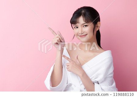 Beautiful young asian woman with clean fresh skin on pink background, Face care, Facial treatment, Cosmetology, beauty and spa, Asian women portrait. Beautiful young asian woman with clean fresh skin on pink background, Face care, Facial treatment, Cosmetology, beauty and spa, Asian women portrait. 119888110
