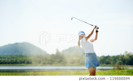 Golfer sport course golf ball fairway. People lifestyle woman playing game golf and hitting go on green grass Golfer sport course golf ball fairway. People lifestyle woman playing game golf and hitting go on green grass 119888894
