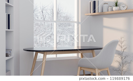 A minimalist display area on a simple table by a window with snowy scenery outsides in a white room. 119889176