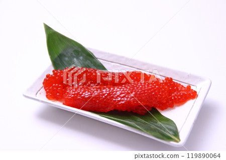 Herring roe marinated in soy sauce on a white square plate 119890064