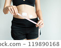 Patient women hands holding measuring tape for measure size wound after surgery on white background 119890168