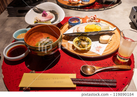 Autumn dinner at a traditional restaurant, hassun and small dishes on a tray 119890184