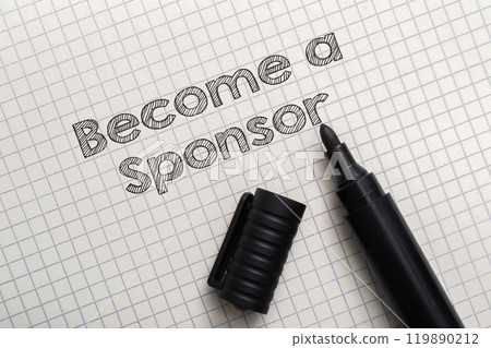 A marker is on a piece of paper with the words Become a Sponsor A marker is on a piece of paper with the words Become a Sponsor 119890212