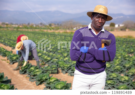 Portrait of confident male farmer on field Portrait of confident male farmer on field 119891489