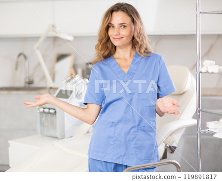 Young female doctor posing in medical room 119891817
