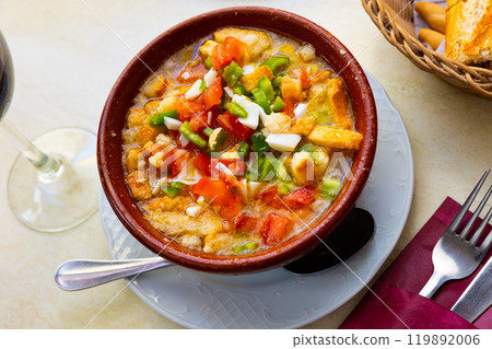 Traditional refreshing Extremadura dish Cojondongo from vegetables and bread in dressing 119892006